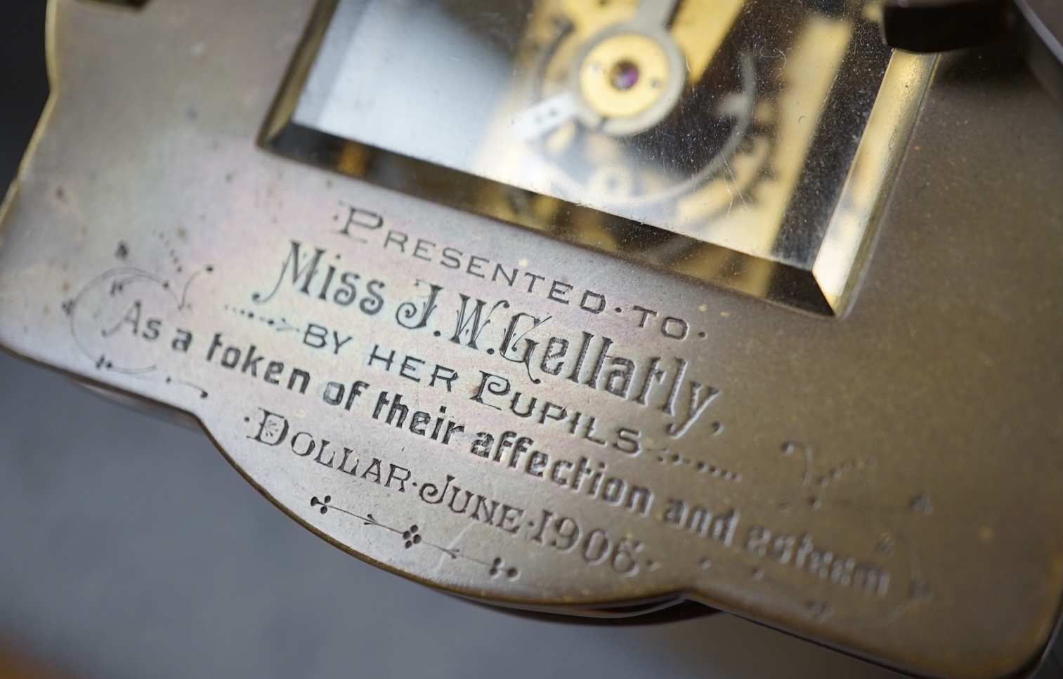 An early 20th century brass carriage timepiece with a fret worked ground, 12cm. Condition - good, but untested if working